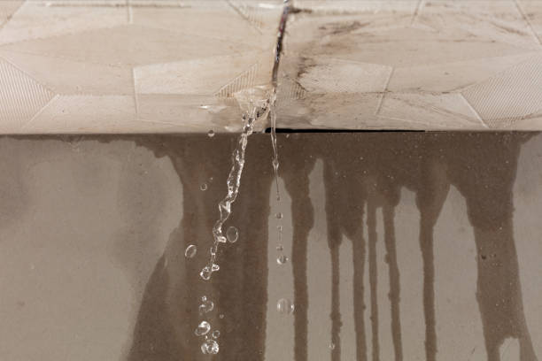 Professional Water Damage Restoration technician working in Hudson, MA